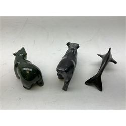 Carved green hardstone model, possibly Inuit, of a polar bear, together with a stone carved boar and a metal dolphin sculpture, bear H5cm  