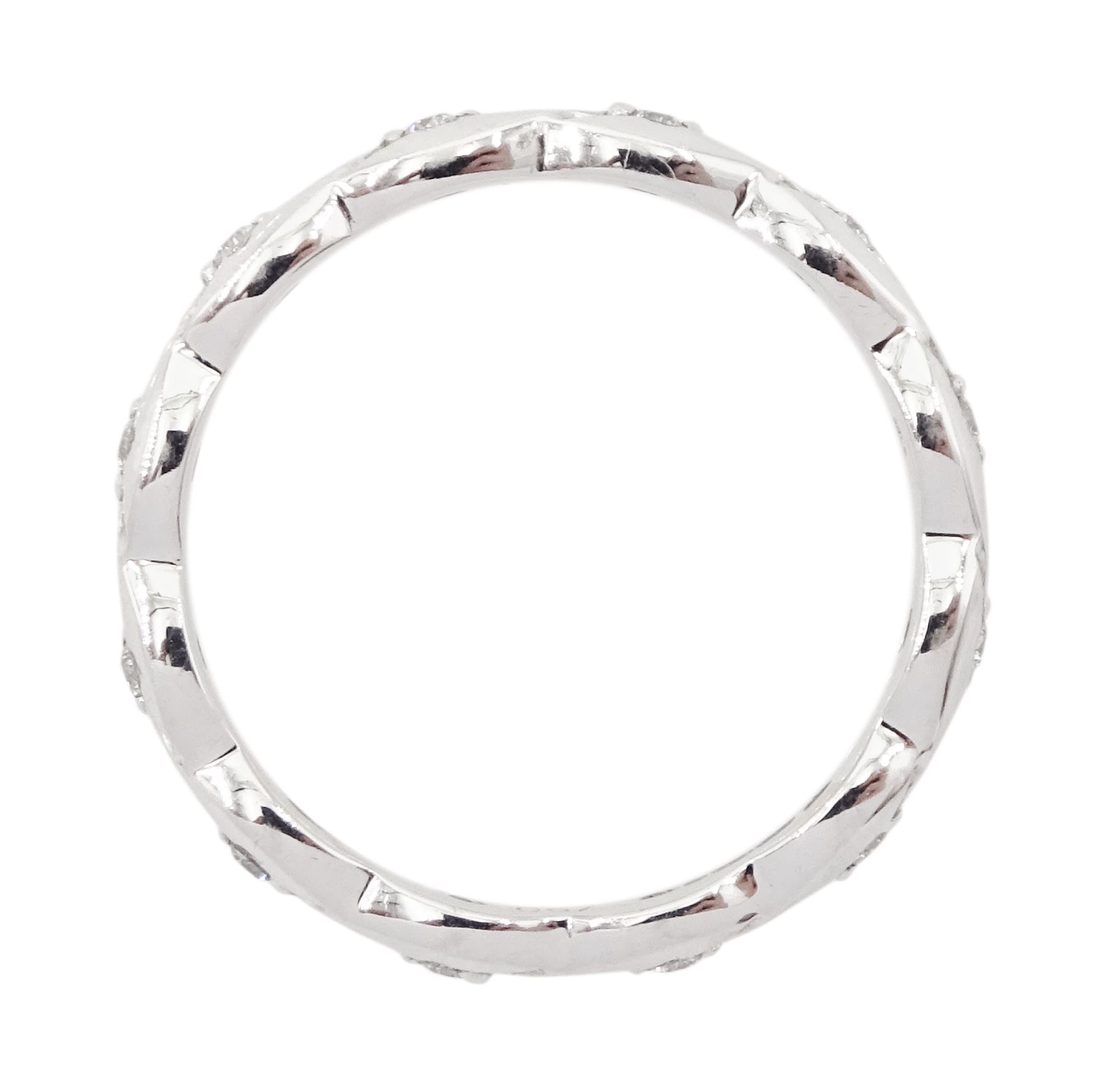 18ct white gold diamond full eternity ring, crossover set with twelve round brilliant cut diamonds, hallmarked