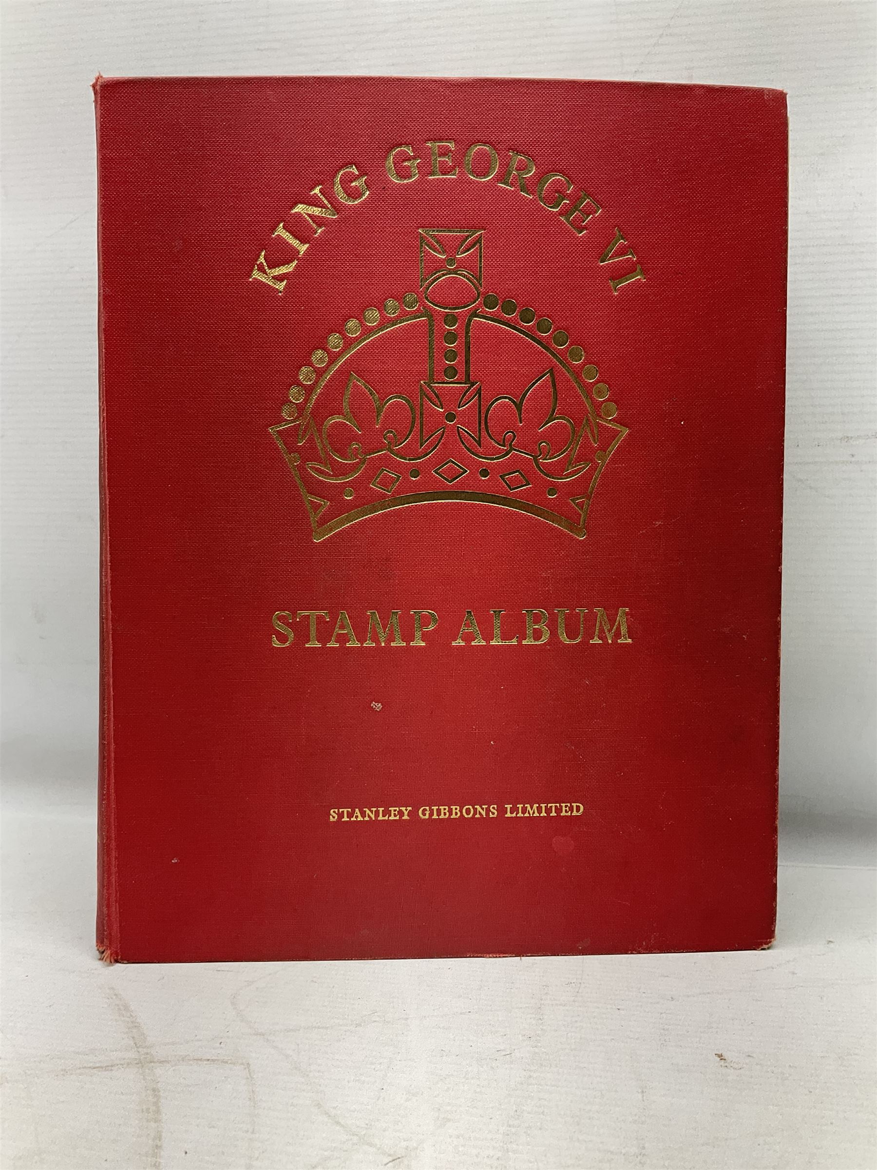 Single album collection of King George VI stamps, including Aden, Antigua, Ascension, Australia, Bahamas, Bahrain, Barbados, Basutoland, Bechuanaland, Bermuda, British Solomon Islands, Brunei, Burma, Cayman Islands, Dominica, Falkland Islands, Gambia, Gilbert and Ellice Islands, Gold Coast, Great Britain 1939-48 set to one pound including ten shilling dark blue, Grenada, Hong Kong, India, Ireland, Jamaica, Leeward Islands, Malta, Mauritius, New Zealand etc