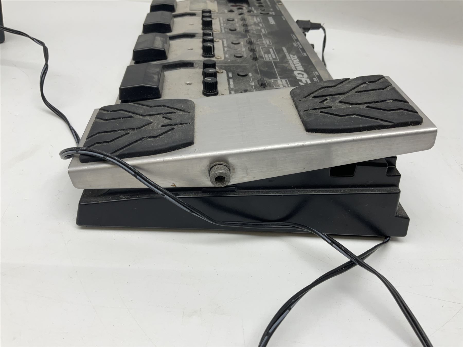 Zoom GFX-4 Guitar Effects processor; quantity of assorted cables; tremolo arms; plectrum wallet; Steepletone SMH10 earphones etc