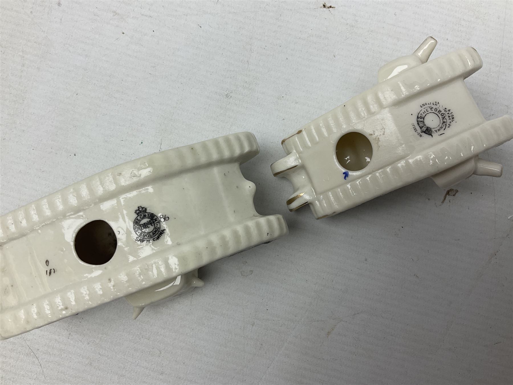 Twelve crested china models of WW1 tanks by Grafton, Arcadian and Carlton china etc with crests from Caistor Lincs, Saffron Walden, Paignton, Evesham etc  , together with a crested china model of the R.M.S Lusitania with New Brighton crest and a two-handled vase for 'The Forts Boxhill' (14)