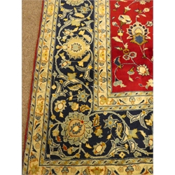  Kashan red ground rug, blue floral repeating border, 355cm x 255cm  