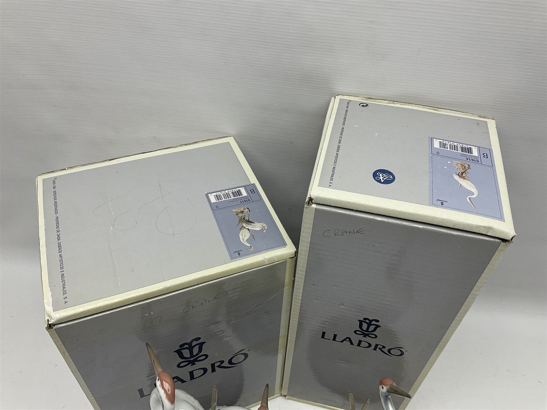 Two boxed Lladro figures, comprising courting cranes no 1611 and dancing crane no 1614, both with original boxes 