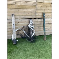 Pair of Edwardian cast iron and wood tennis posts, with net - THIS LOT IS TO BE COLLECTED BY APPOINTMENT FROM DUGGLEBY STORAGE, GREAT HILL, EASTFIELD, SCARBOROUGH, YO11 3TX