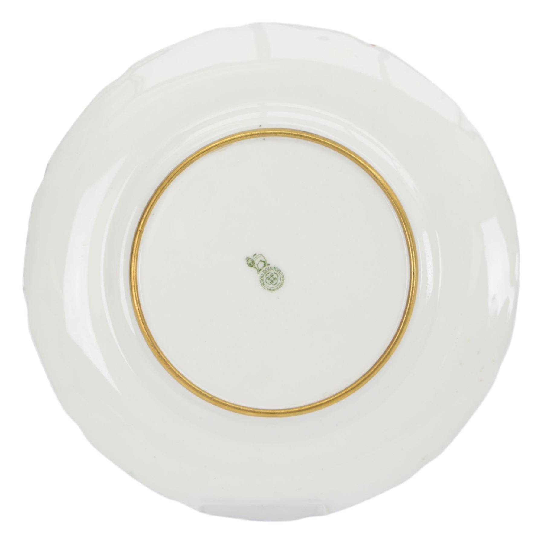 Six 19th century and later cabinet plates, including Royal Doulton example, the central panel decorated a with landscape signed T. Parton 