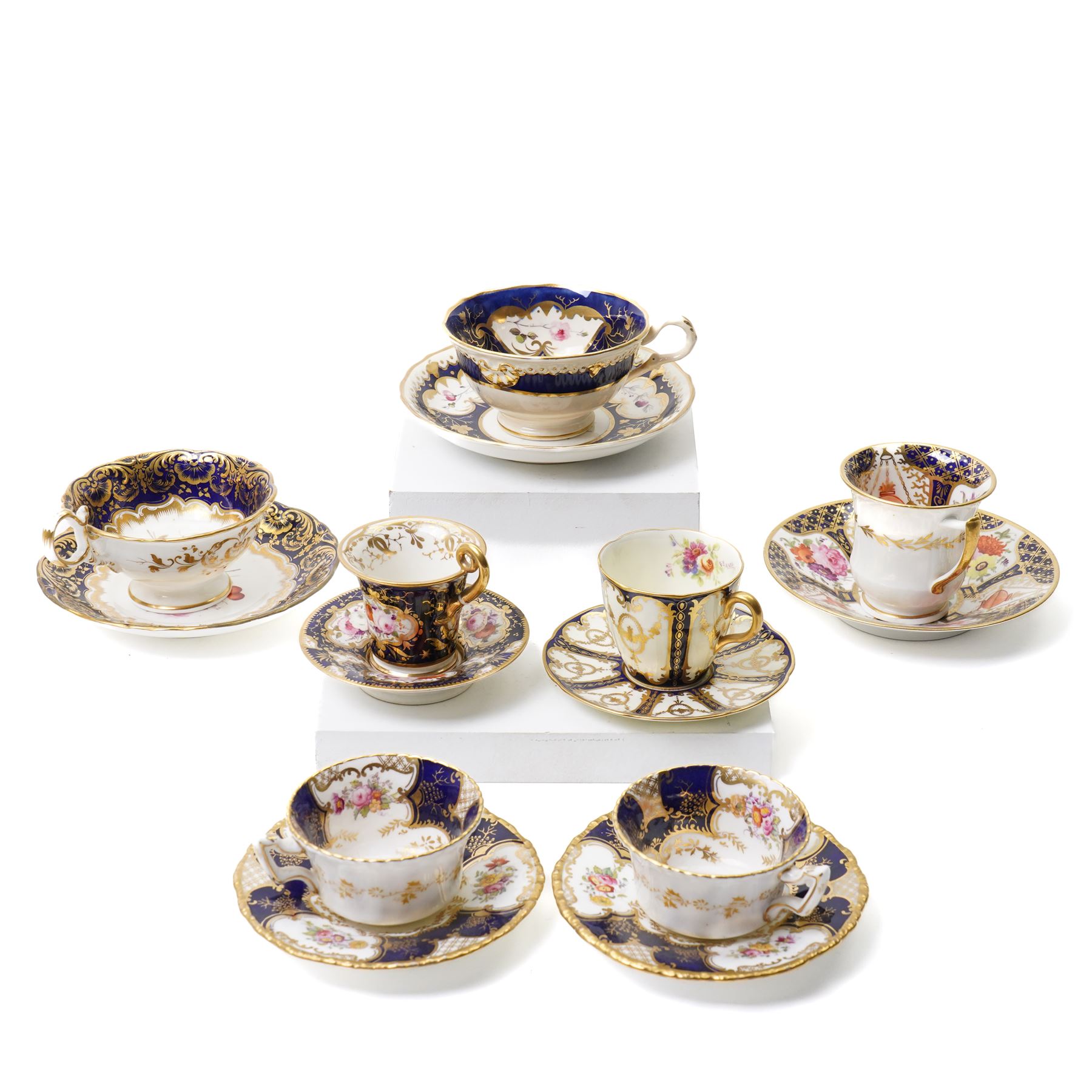 Grainger Lee & Co Worcester teacup, together with a collection of cobalt blue cabinet cups and saucers,  including a Royal Doulton hand-painted example by E Percy, and various others 19th century and later, mostly unmarked (7 pairs)