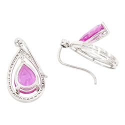 Pair of 18ct white gold pink sapphire and diamond earrings, the pear cut sapphires suspended within a halo of round brilliant cut diamonds, total sapphire weight approx 6.00 carat, total diamond weight approx 0.45 carat