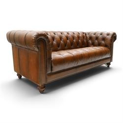 Barker and Stonehouse - traditional shape 'Ullswater' three seater Chesterfield club sofa, rolled back and arms upholstered in buttoned tan leather with studwork, raised on turned feet