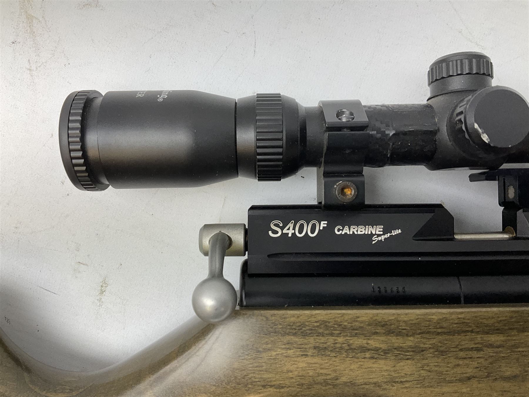 Air Arms S400F Carbine bolt-action .22 multishot air rifle, pump-up action, adjustable trigger, fitted with sound moderator and Nikko Stirling Mountmaster 3-9 x 50 telescopic sight, complete with stirrup type pump, pressure gauge etc, serial no.135456, L106cm; in gun sling