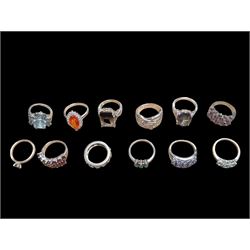 Twelve silver stone set rings