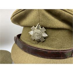 Early 20th century British army peaked cap with Scots Guards brass badge; another later with Scots Guards Staybrite badge; modern pith helmet; British army water bottle with later webbing cover; pair of Carl Zeiss blc 7 x 50 binoculars; and Dunn & Co bowler hat