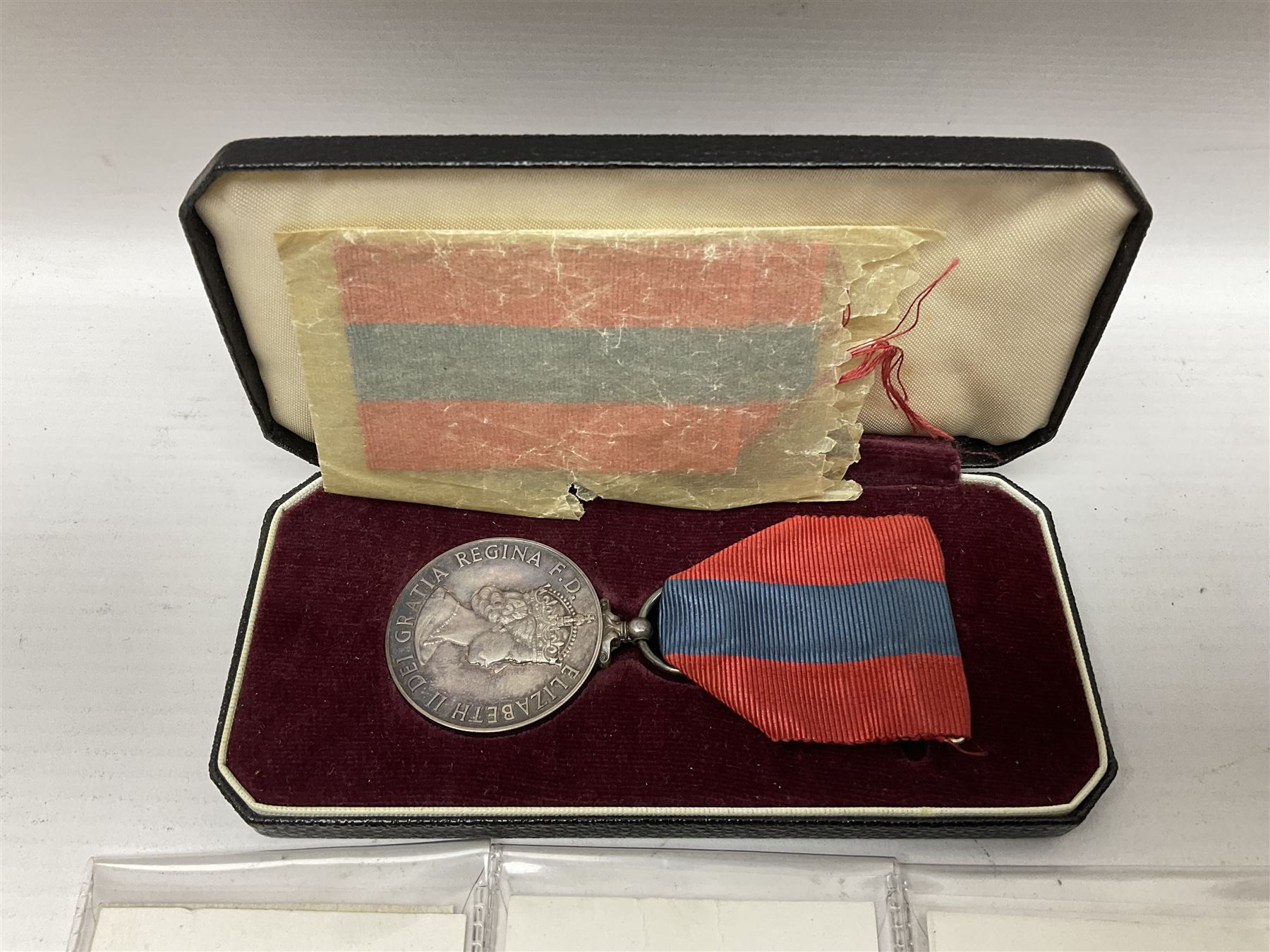 Two Imperial Service Medals to Elsie Hannah Ferguson and Fred Whitehead; each in original case; WWI Special Constabulary Medal to Inspr. Alfred W. Thompson; modern Prisoner of War Medal; cased; replica Victoria Cross and India Mutiny Medals with archive of information relating to Pte. Robert Newell V.C. 9th Lancers; replica Victoria Cross and George Cross with miniatures; and other replica medals etc