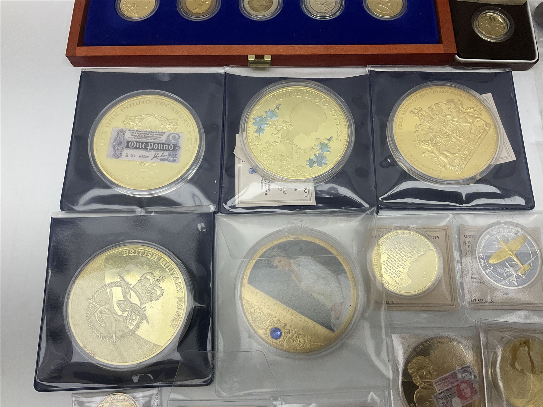 Mostly commemorative and fantasy coinage including commemorative crowns, 2018 'The Capsule Edition featuring the 2018 Paddington 50p coins' in display case, The Royal Mint Solomon Islands 2007 one ounce fine silver five dollars coin on card etc