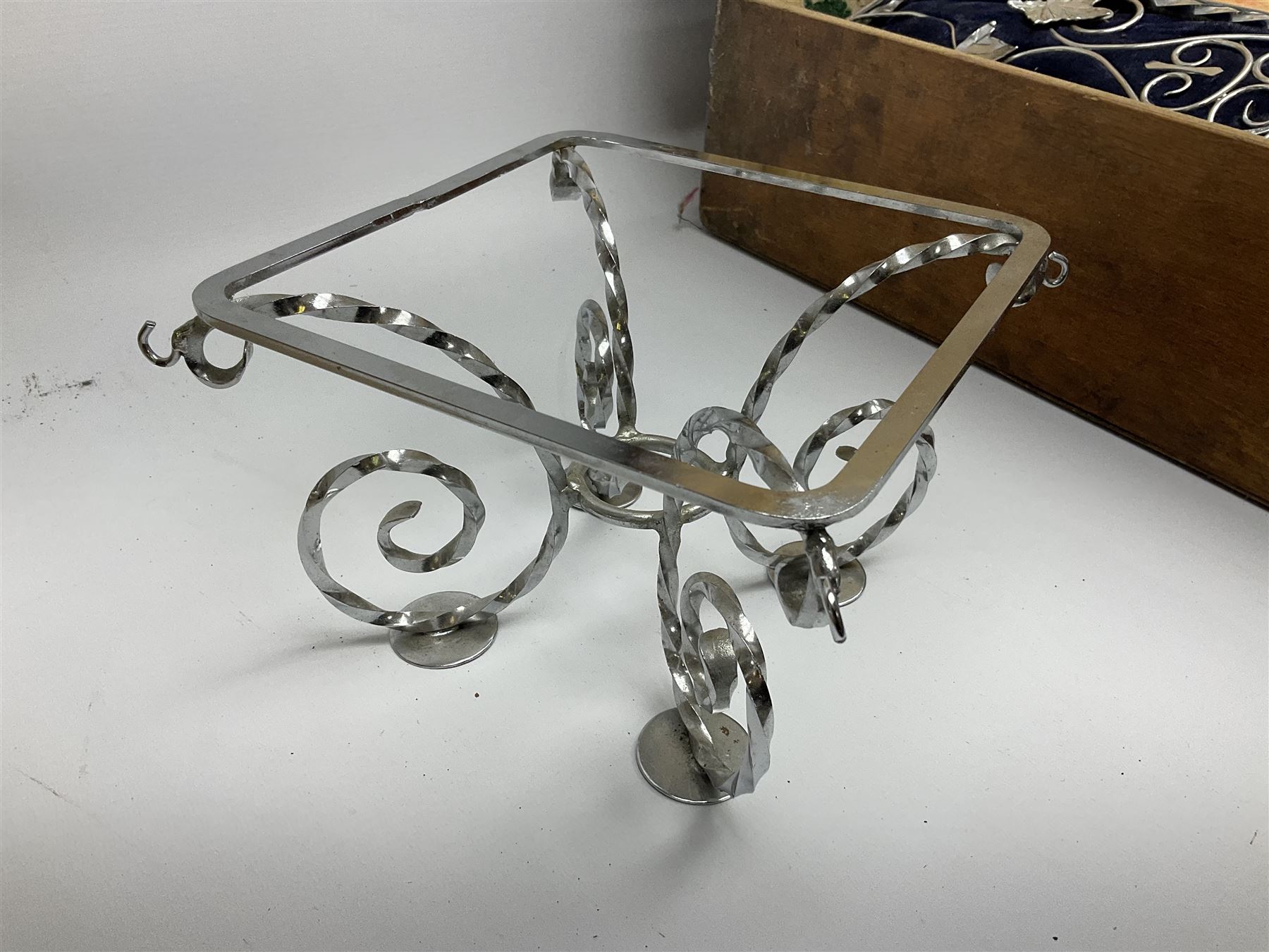 Edwardian wedding cake stand, the blue velvet cushion applied with wirework scroll, in wood box, 56cm X 56CM