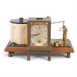 Brass barograph with integral brass clock, upon a wooden wooden plinth