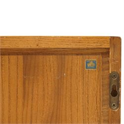 Ercol - elm plate rack, rectangular form with rounded corners, fitted with two open shelves divided by staggered upright partitions, fixings for hanging