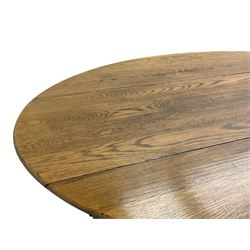 Large 18th century design oak wake or dining table, oval drop-leaf top, turned supports with double gate-leg action base, united by moulded stretchers 
