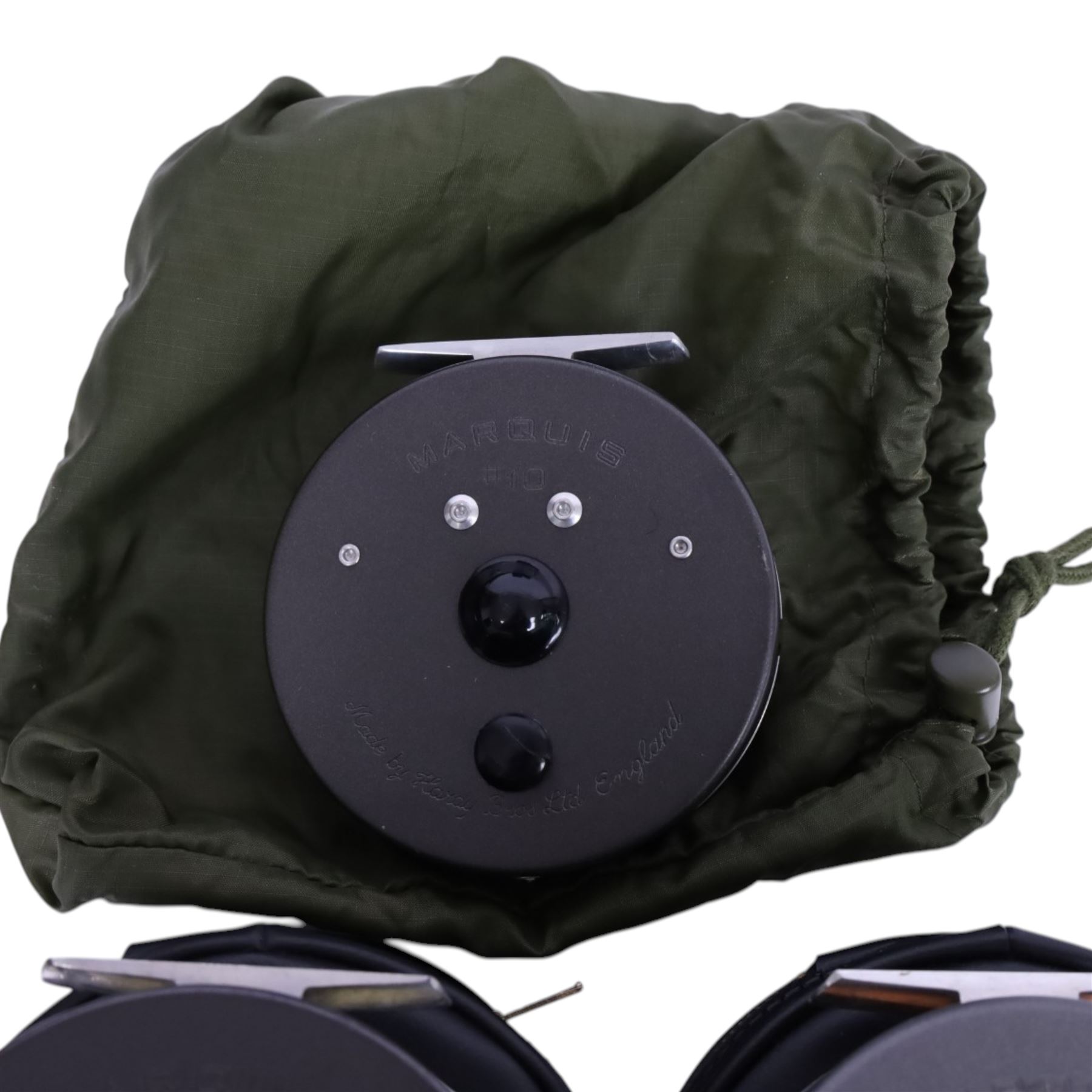 Three Hardy Bros Marquis fly fishing reels, comprising two No. 10 reels and a No.1 Salmon reel, two within black Hardy cases