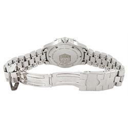 Tag Heuer gentleman's stainless steel quartz wristwatch, Ref. WK1112-0, silvered dial with baton hour markers and date aperture, on original stainless steel bracelet, with fold-over clasp
