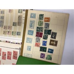 Mostly Great British stamps in albums and on pages including King George V, Queen Elizabeth II used stamps, small number of World stamps etc