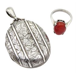 Victorian silver locket with bright cut floral decoration and a Scottish silver cabochon agate ring, hallmarked
