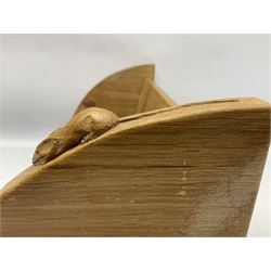 'Mouseman' oak book trough, curved end supports, carved with mouse signature, by Robert Thompson of Kilburn