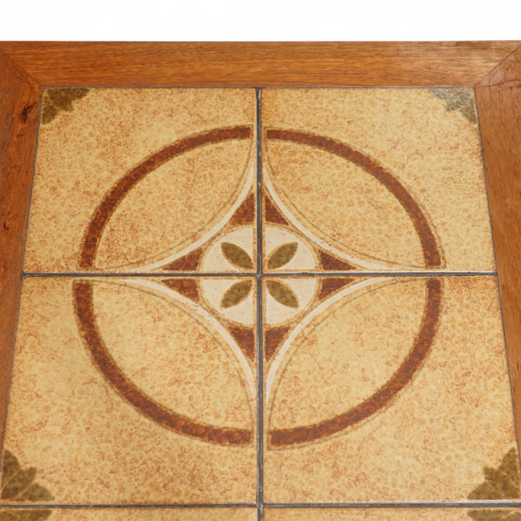 Mid-20th century Danish teak coffee table, rectangular form with inset ceramic tiled top decorated with circular and foliate motifs, raised on square legs