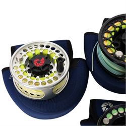 Four Nautilus USA fly reels, comprising T12, no. five and two no. ten models, all within Nautilus pouches