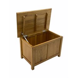 Oak blanket box, hinged lid and panelled front 