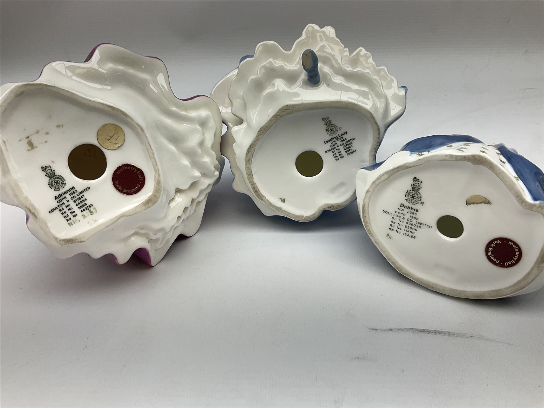 Royal Doulton figures, comprising Lynsey HN3043, Tinkle Bell HN1677, Debbie HN2385, Bedtime HN 1978, Darling HN1985, Adrienne HN3159 and Leading Lady HN2296