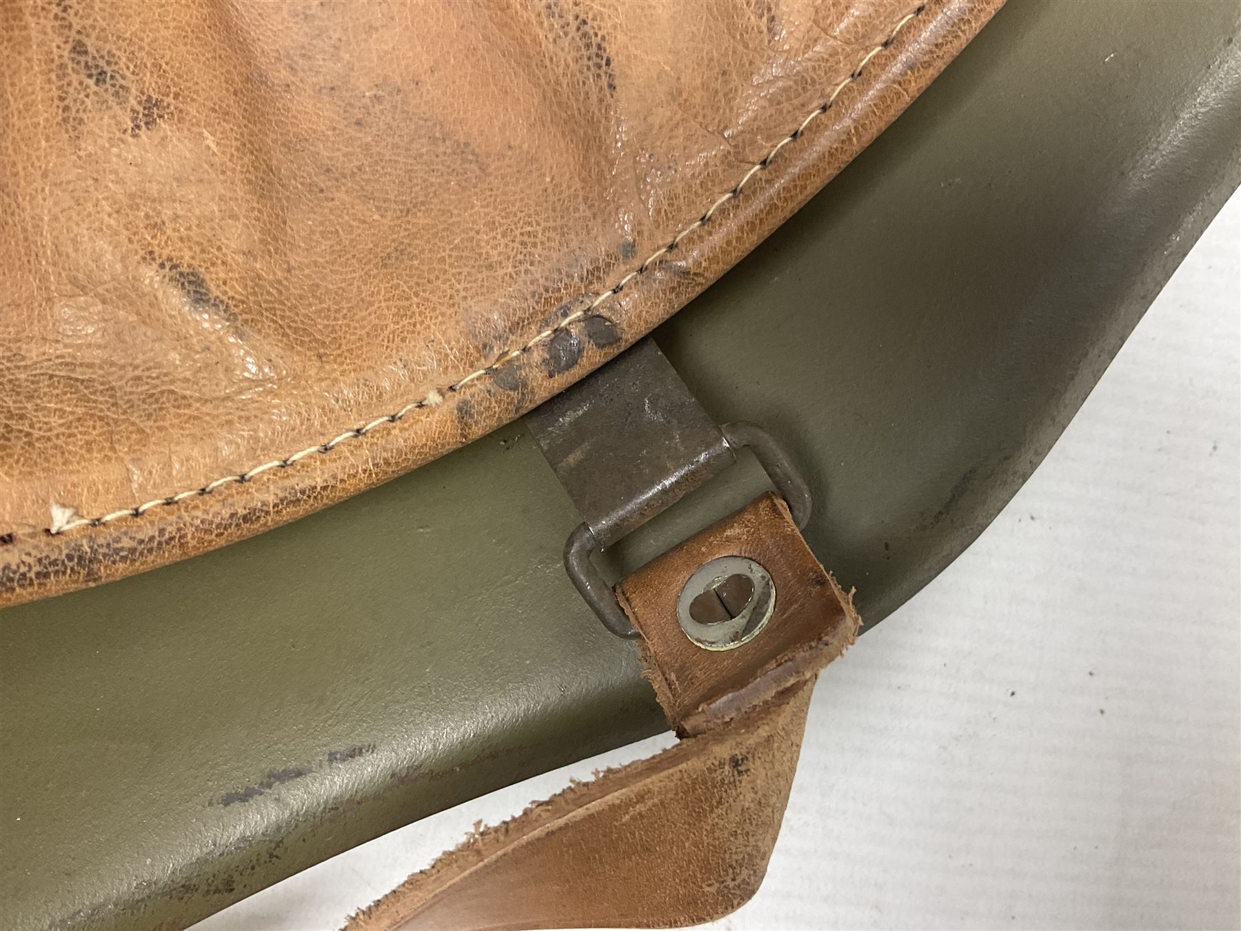 Two 1960s East Block Soviet style helmets - Czechoslovakian and Russian; both with liners (2)