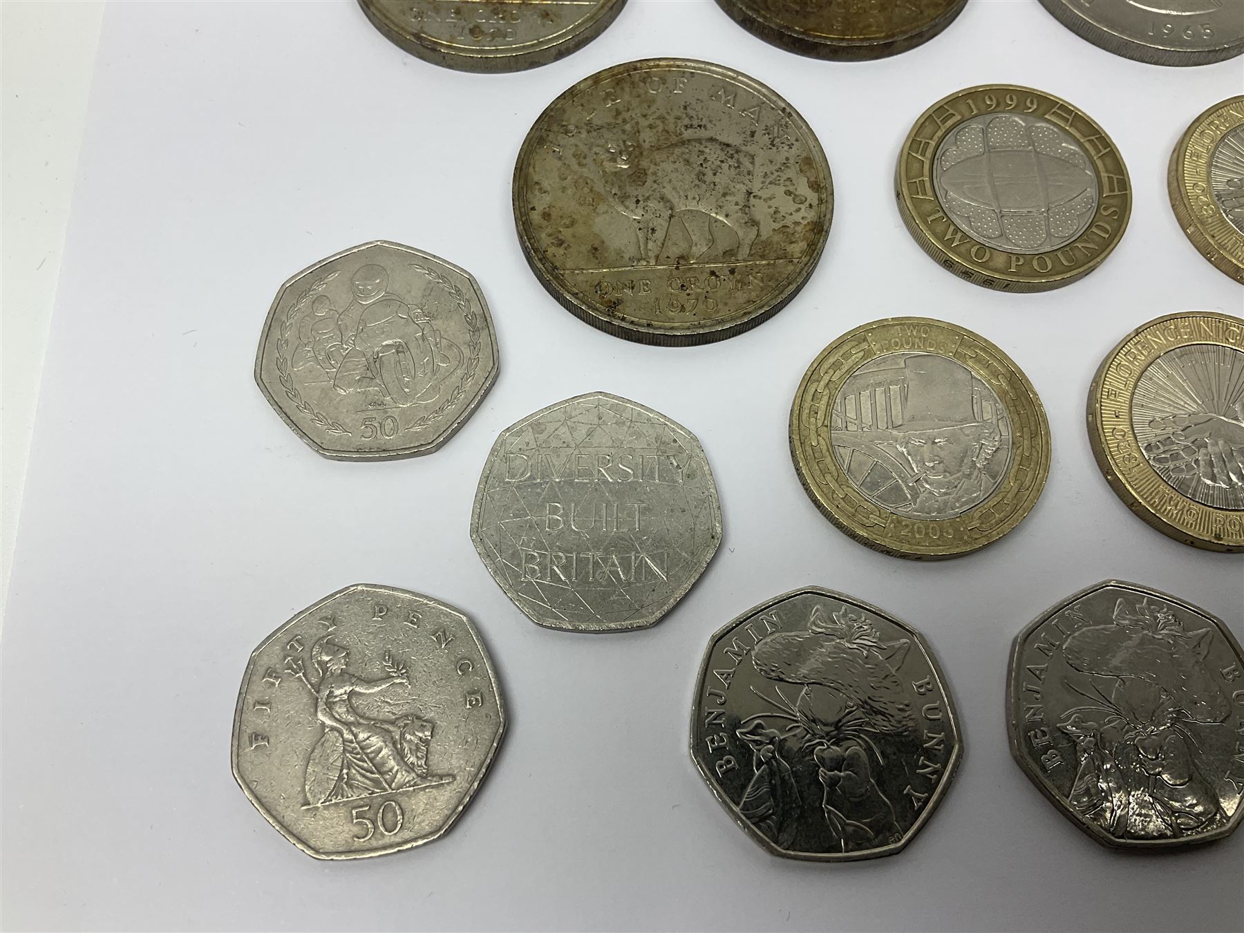 Queen Elizabeth II commemorative coins, including three Isle of Man 1970 crown coins, two further UK 1965 and 1970 crowns, three 2017 ‘Benjamin Bunny’ fifty pence pieces, two 1999 ‘Rugby World Cup’ two pound coins, Isle of Man 1999 ‘Phillip McCallen’ fifty pence piece etc