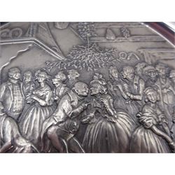 Modern silver 'The Birmingham Mint 1975 Christmas Plate', of circular form, embossed to the centre with a scene of merriment and dancing, hallmarked Birmingham Mint, Sheffield 1975, contained in fitted glazed case, plate D20cm