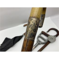 Early 20th century curved horn handle walking stick with hallmarked silver mounts, engraved L Russell 1918, together with a shooting stick by William Mills Birmingham, with leather handle, 'The Featherwaite' shooting stick and an umbrella with wooden handle