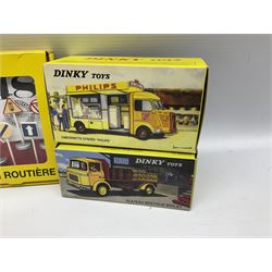 Ten Atlas Dinky die-cast models and accessories including, Bedford TK Tipper no. 435, Austin Wagon no. 412, two Miniatures, 25 O Camion Laiter, 'Panneaux De Signalisation Routiere' and others (10)