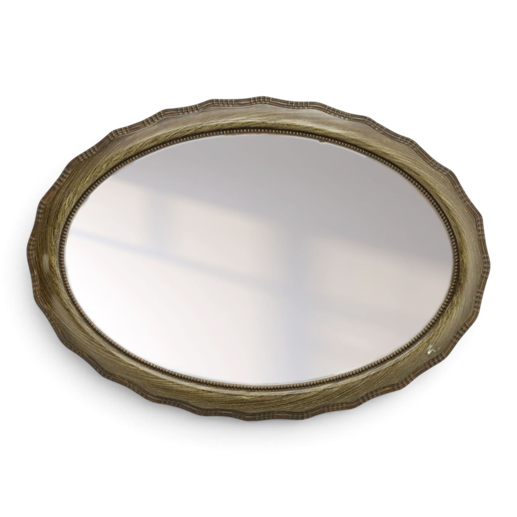 Oval wall mirror, shaped frame with bevelled plate 