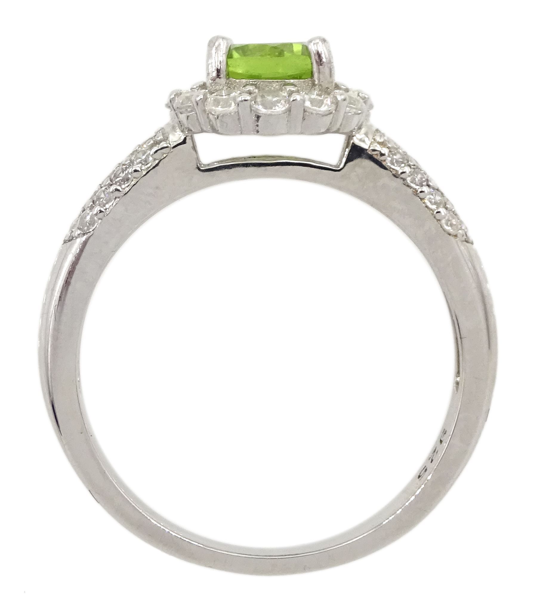 Silver peridot and cubic zirconia flower cluster ring, stamped 925