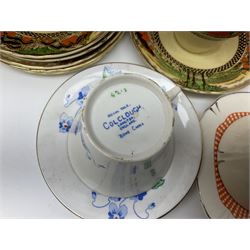 Four Portmeirion storage jars with Greek key pattern on an orange ground, together with Tams Ware tea service and other ceramics