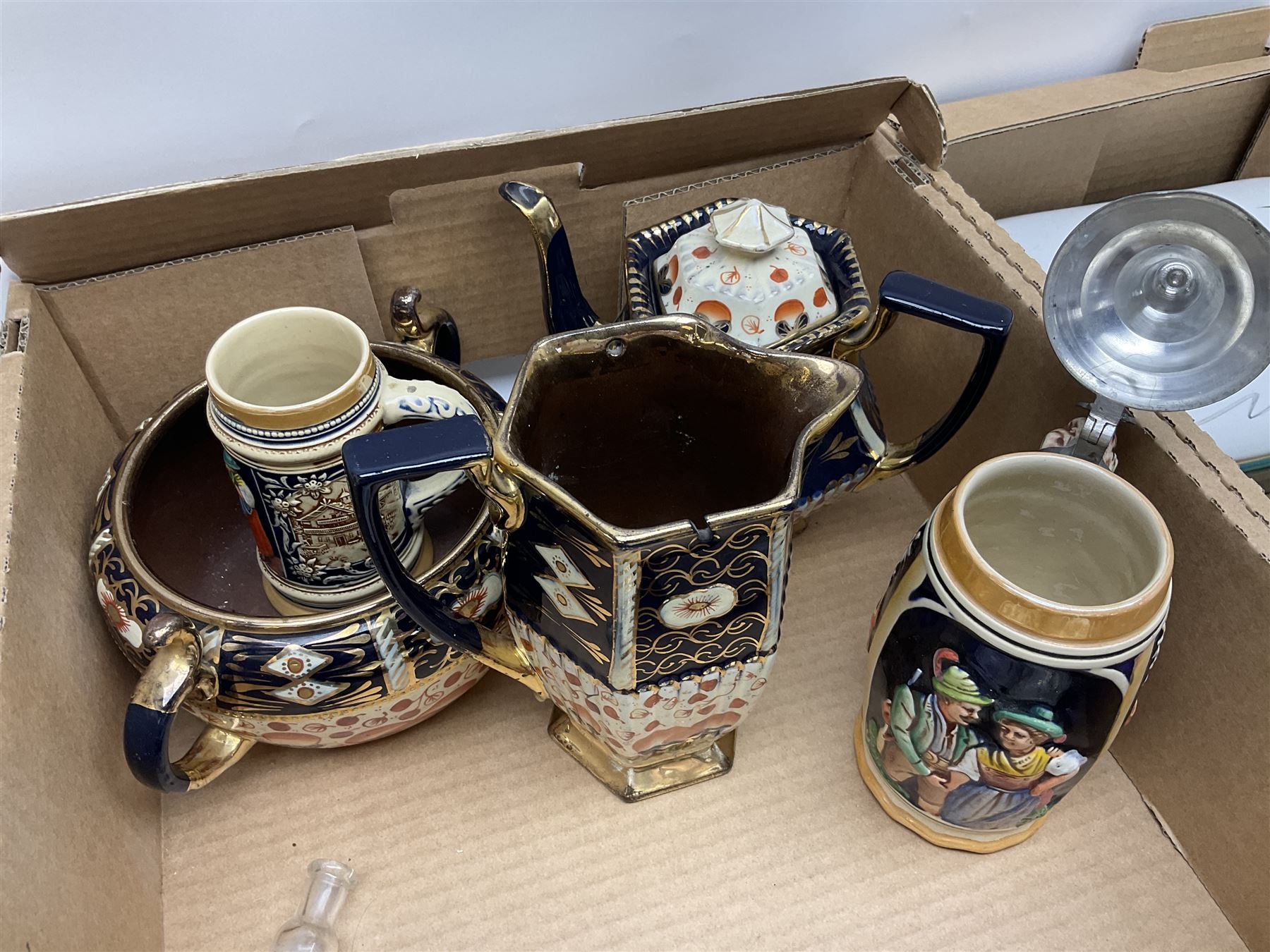 Denby Greenwheat pattern dinner wares, together with Royal Doulton Tumbling Leaves pattern tea and dinner wares, Royal commemorative ceramics including Wedgwood Jasperware table lighter, pair of Victorian glass hand painted vases, large blue and white urn with lid, Noritake part tea set, Staffordshire style dog and other ceramics and collectables, in boxes