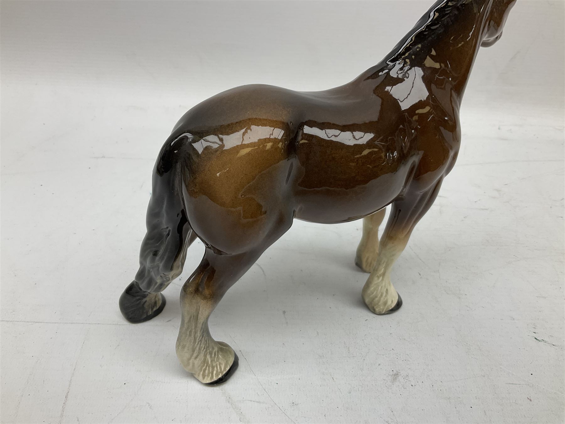 Seven Beswick figures of horses, including Connemara pony in grey no.1641, Arab in bay no.1265, large foal in grey no.947 etc, together with a Goebel figure of a horse (8)