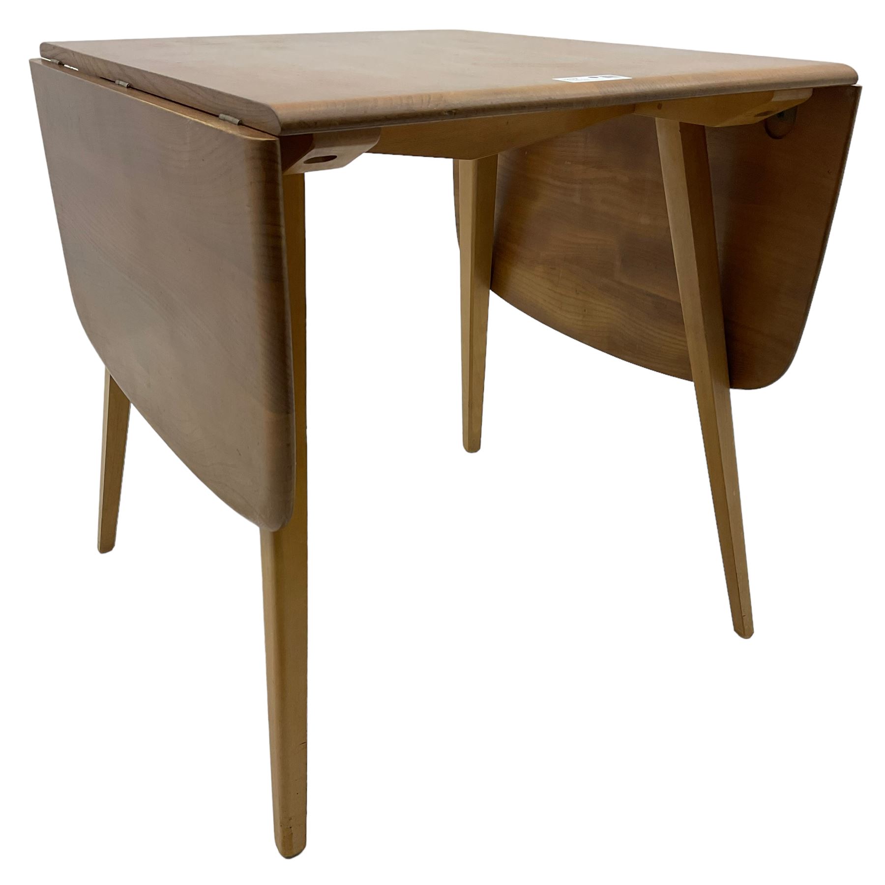 Ercol - elm and beech dining table, rectangular drop-leaf top on splayed square tapering supports 