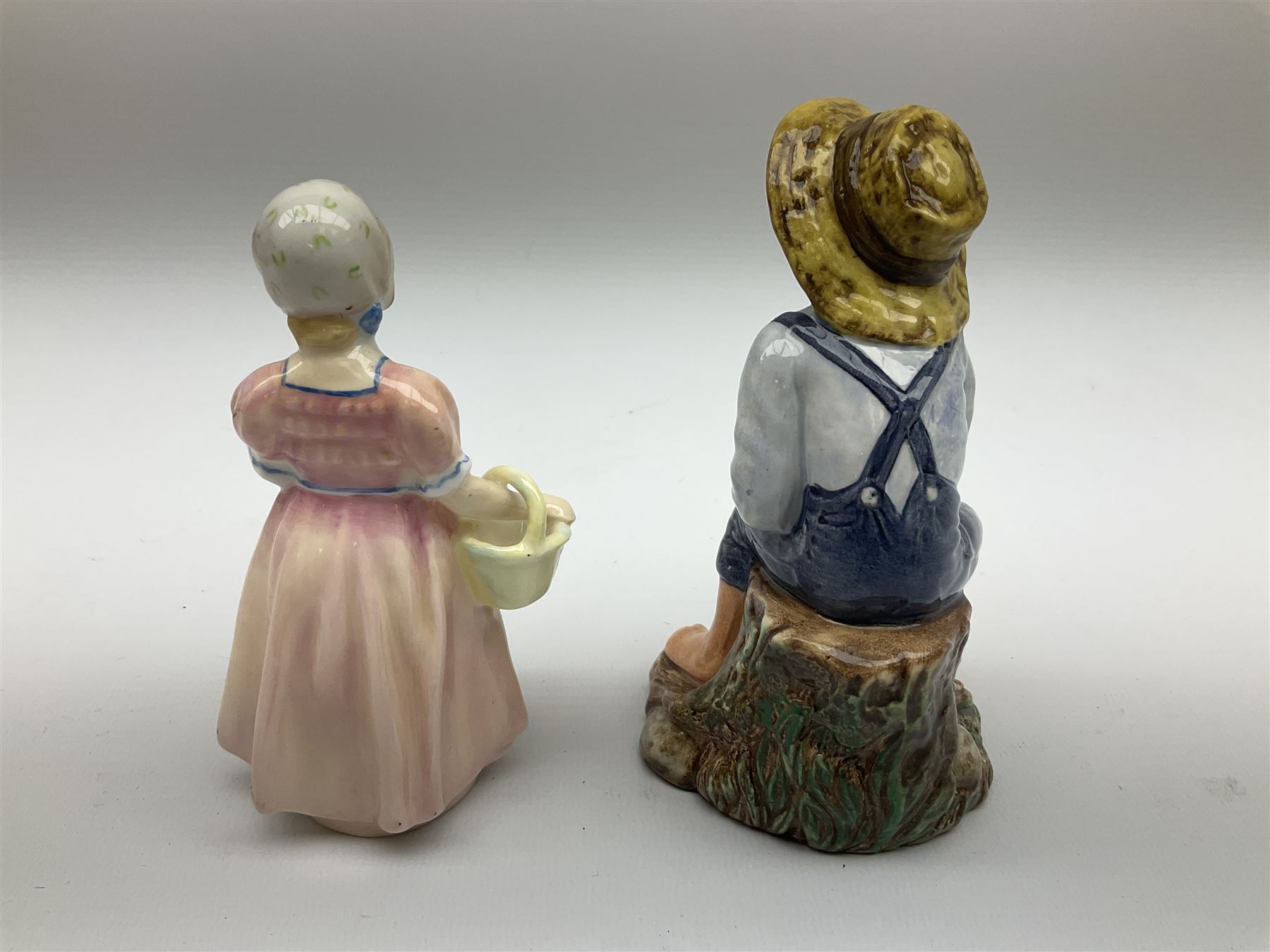 Group of figures, comprising six Royal Doulton examples, Daydreams HN1731, Silks and Ribbons HN2017, Tom Sawyer HN2926, Marie HN1370, Bo-Peep HN1811, and Tinkle Bell HN1677, together with a Dresden type 'lace' example, and a Coalport 'Swiss Cottage', (8)