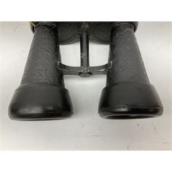 Pair of WWII German U-boat binoculars probably 7 x 50 by Leitz, with rubber eye piece protector covers and leather case stamped with Kriegsmarine mark to the lid and dated 1944, with leather strap.