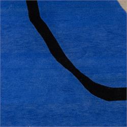 Rugs by Design - ‘Soft Landing’ Nepalese thick pile wool rug, with contemporary abstract design on a taupe ground, decorated with rounded blue forms and a bold black irregular loop motif