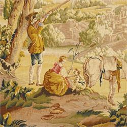Large French Aubusson style verdure tapestry, of 18th century design but later, depicting hunters resting, 133cm x 194cm