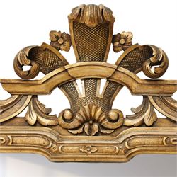 Georgian design giltwood overmantel mirror, arched rectangular plate within a moulded frame, the cresting carved with scrolling acanthus and shell motifs, trailing foliate decoration continuing to the shoulders and lower apron
