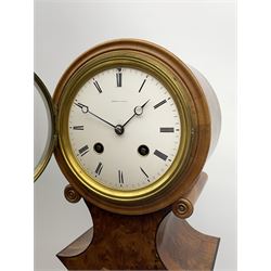 Miniature longcase clock in yew wood case, circular Roman dial signed ‘Howell & James Paris’ enclosed by bevelled glass bezel and surround by mould and roundels, shaped and waisted trunk on rectangular base with top mould, on ogee bracket feet, twin train movement striking the hours and half on bell, the movement stamped ‘Howell & James Paris’ and numbered ‘13092’ 