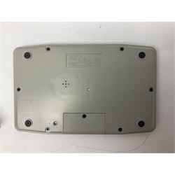 Collection of retro handheld games, including Nintendo Game & Watch ‘Snoopy Tennis’ (1982) and ‘Squish’ (1986) both with instruction booklets, Casio CG-600 ‘Star Invader’ with box, 3 in 1 LCD cartridge game including ‘Soccer’, ‘Invader’ and ‘Bomb Finder’ games, and two Grandstand ‘Pinball Wizard’ (1988) games, both with original boxes