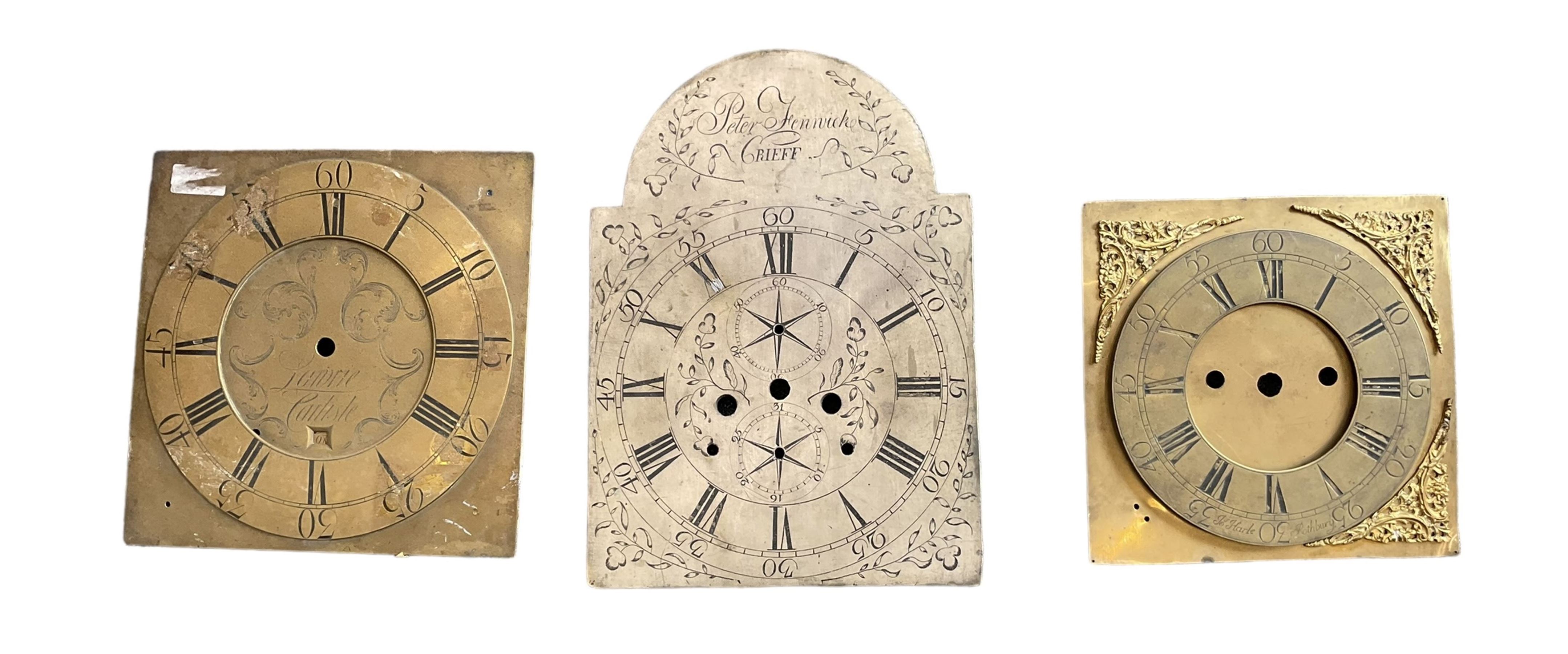 Six clock dials and an engraved brass chapter ring.
Comprising of four 18th century brass longcase dials with two painted wall clock dials and an 18th century engraved single-handed brass chapter ring.