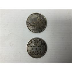 Four post-WW2 'silver' medallions of Adolf Hitler/German interest, two depicting Von Hindenburg also; and pair of 1960s trench art shell case bases as ashtrays mounted with Libyan Five Milliemes coins as cigarette rests (6)